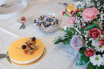 easter table setting with cake and sweets