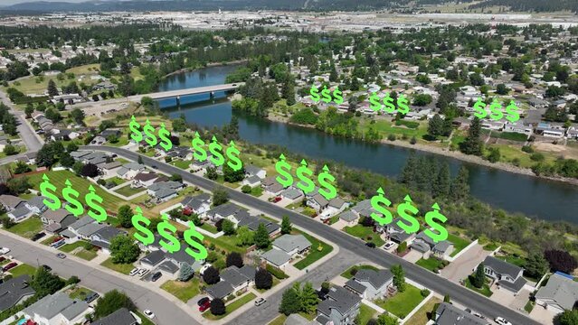 Aerial view of Spokane, Washington's suburban neighborhoods with dollar signs appearing over houses to represent the rising market rates.