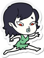 sticker of a cute cartoon vampire girl