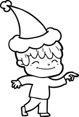 line drawing of a happy boy wearing santa hat