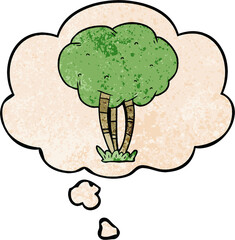 cartoon tree and thought bubble in grunge texture pattern style
