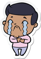 sticker of a cartoon man crying
