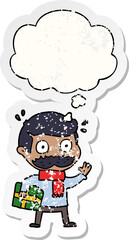 cartoon man with mustache and christmas present and thought bubble as a distressed worn sticker