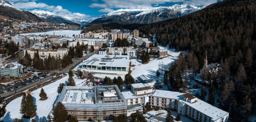 Fototapeta na wymiar Aerial winter view of the worldwide famous ski resort of St. Moritz, Graubunden, Switzerland