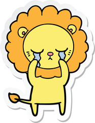 sticker of a crying cartoon lion