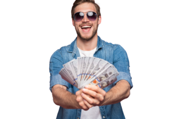 Portrait of joyful man in jeans shirt holding bunch of money banknotes while standing and celebrating isolated over transparent background