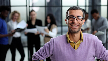 Fototapeta premium portrait of a young casual man with glasses. In everyday clothes