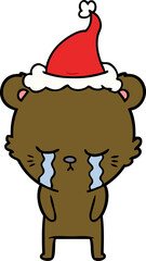 crying line drawing of a bear wearing santa hat