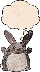 cartoon rabbit and thought bubble in grunge texture pattern style