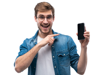Portrait of a cheerful young man in jeans t-shirt isolated over transparent backgound, showing blank screen mobile phone