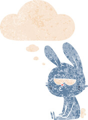 cute cartoon rabbit and thought bubble in retro textured style