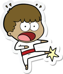 sticker of a cartoon boy karate kicking