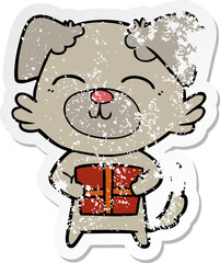 distressed sticker of a cartoon dog with present