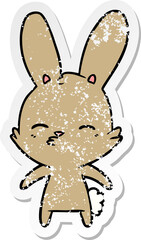 distressed sticker of a curious bunny cartoon