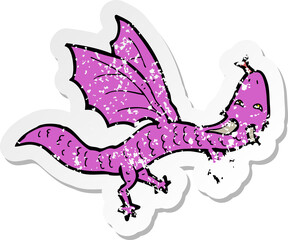 Fototapeta premium retro distressed sticker of a cartoon little dragon