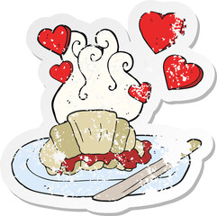 retro distressed sticker of a cartoon tasty breakfast croissant