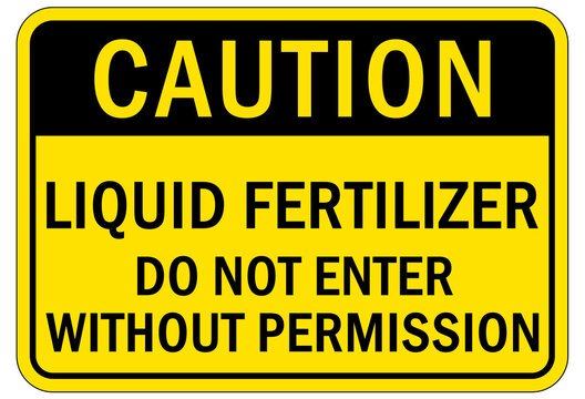 Pesticide chemical hazard sign and labels liquid fertilizer. Do not enter without permission