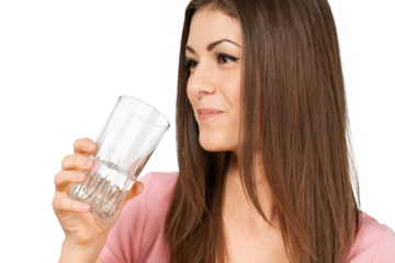 Friendly Young Woman Holding Glass of Water - Isolated