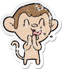distressed sticker of a crazy cartoon monkey