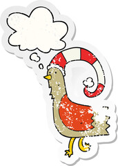 cartoon chicken in funny christmas hat and thought bubble as a distressed worn sticker