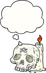 cartoon spooky skull and candle and thought bubble