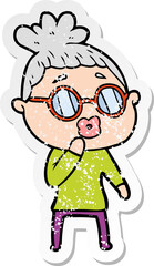 distressed sticker of a cartoon woman wearing spectacles