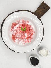 Bubur Sagu Mutiara, Indonesian Dessert Porridge. Made from pearl sago (sagu mutiara), sugar, pandan leaves, and coconut milk. Space for text