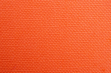 The Abstract orange wrinkled paper texture background or backdrop.
