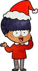 happy textured cartoon of a boy wearing santa hat