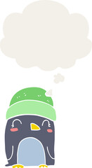cute cartoon penguin and thought bubble in retro style