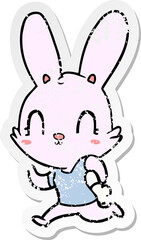 Fototapeta na wymiar distressed sticker of a cute cartoon rabbit running