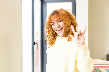 young red hair latin pretty womann at new cool home