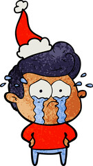 textured cartoon of a crying man wearing santa hat