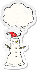 cartoon christmas snowman and thought bubble as a distressed worn sticker