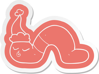 cartoon  sticker of a worm wearing santa hat