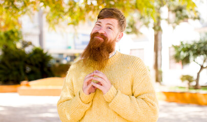 red hair bearded man scheming and conspiring, thinking devious tricks and cheats