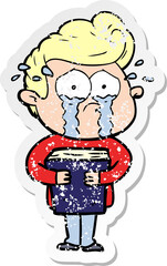 distressed sticker of a cartoon crying man holding book
