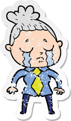 distressed sticker of a cartoon crying woman