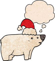 cartoon bear wearing christmas hat and thought bubble in grunge texture pattern style
