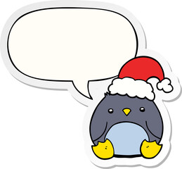cute cartoon penguin wearing christmas hat and speech bubble sticker