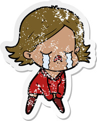 distressed sticker of a cartoon girl crying