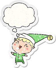 cartoon happy christmas elf and thought bubble as a distressed worn sticker