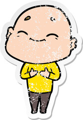 distressed sticker of a happy cartoon bald man