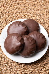 photo of a whole chocolate-covered marshmallow