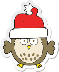 sticker of a cartoon owl wearing christmas hat