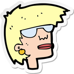 sticker of a cartoon female face with glasses