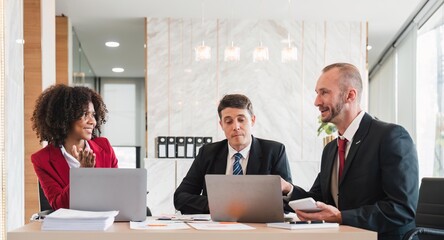 Business team Diverse colleagues gather brainstorm discuss financial statistics at office meeting. finance, teamwork ,data Graphs Charts concept