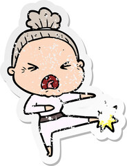 distressed sticker of a cartoon angry old woman