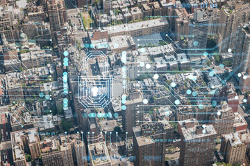 Aerial top view of New York City building roofs. Bird's eye view from helicopter of metropolis cityscape. The concept of cyber security to protect confidential information, padlock hologram