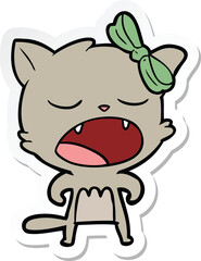sticker of a cartoon cat meowing